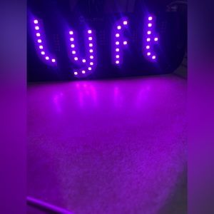 Lyft pink sign light
